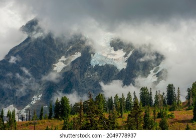 Dramatic Clouds Hover Over the Glaciers on Mt. Shuksan, Washington. Hanging Glacier below the Summit Pyramid on Mount Shuksan in North Cascades National Park, Washington State, USA. 