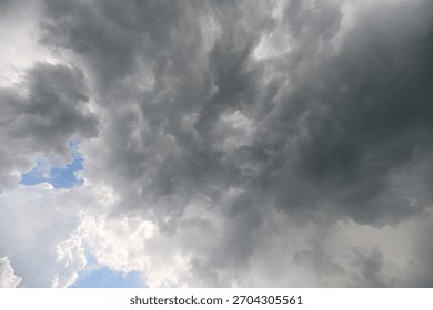 Dramatic Clouds Looming Up Above Capturing the Unmatched Power of Natures Fury and Beauty