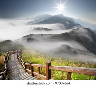 Dramatic clouds with mountain and tree - Powered by Shutterstock