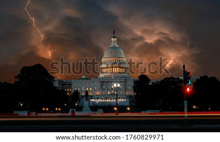 Dramatic clouds on United States Capitol Building in Washington DC USA dark stormy sky with lightnings