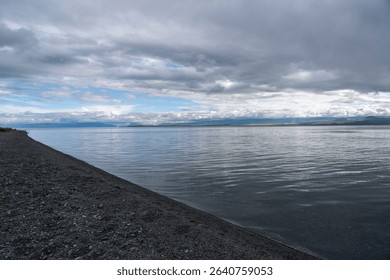 Dramatic Clouds Over a Calm Mountain Lake - Powered by Shutterstock - Get 15% off with code: PIKWIZARD15
