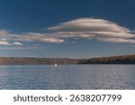 dramatic clouds over cayuga lake in Trumansburg new York in autumn.