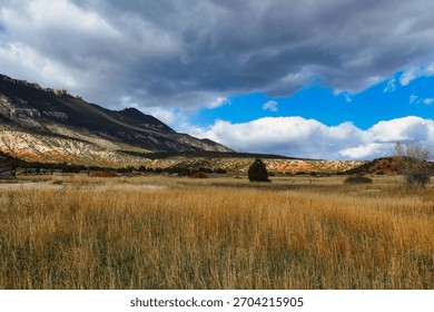 Dramatic Clouds over the Ewing-Snell Historic Ranch Site and the Pryor Mountains in Bighorn Canyon National Recreation Area in Montana.
