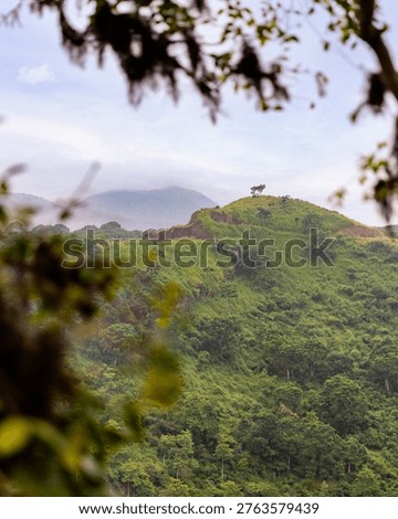 Dramatic clouds over the lush hills in the Highlands of Santa Cruz - Galapagos Islands, Ecuador