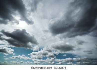 Dramatic Clouds In Sky Background.