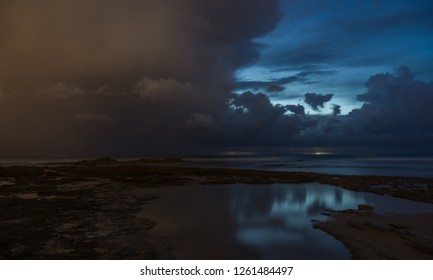 Dramatic clouds and waves, strong wind with sunset seascape
