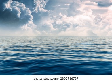 Dramatic Cloudscape Over Calm Blue Ocean with Panoramic Horizon, Serene Seascape Background