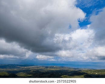 Dramatic cloudscape over a coastal landscape
