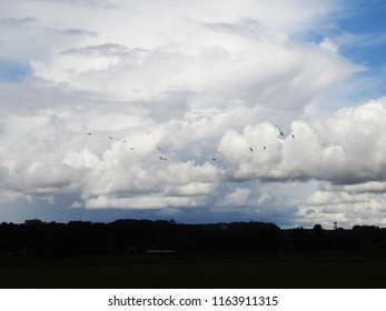 dramatic cloudscape over silhouette horizon