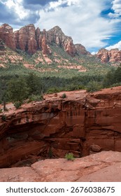 Dramatic cloudscape and sinkhole at Devil's Kitchen in Arizona