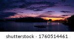 Dramatic cloudscape at twilight blue hours over the empty marina on Cape Cod Island