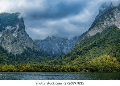 Dramatic cloudy mountain landscape over Königssee lake
