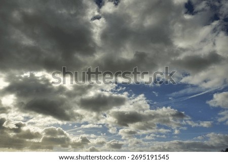 Dramatic Cloudy Sky with Breaks of Light Over Blue Sky and Horizon, Weather Scene, UK. 27 October 2025 