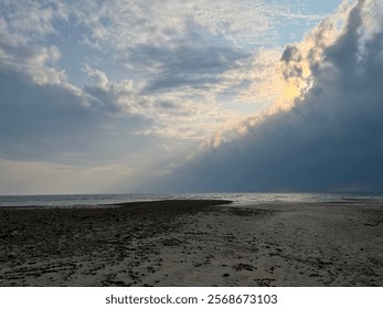 Dramatic Cloudy Sky Over Coastal Shoreline