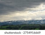 Dramatic cloudy sky over the mountain peaks