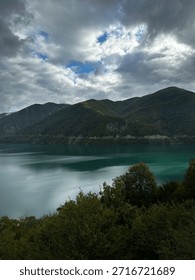 Dramatic Cloudy Sky Over Mountain Lake Landscape