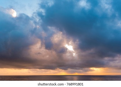 Dramatic cloudy Sky over Sea, morning sky and water, sunrise above ocean