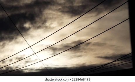 Dramatic Cloudy Sky With Powerlines