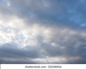 Dramatic cloudy sky of a sudden cold day on dark background - Shutterstock ID 521540416