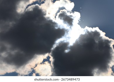 Dramatic cloudy sky with sunlight breaking through clouds creating stunning rays of light highlighting natures beauty atmosphere and serene landscape