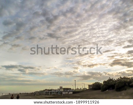 A dramatic cloudy sky at sunset on the beach  Mar de Ajo, La Costa, Buenos Aires, Argentina