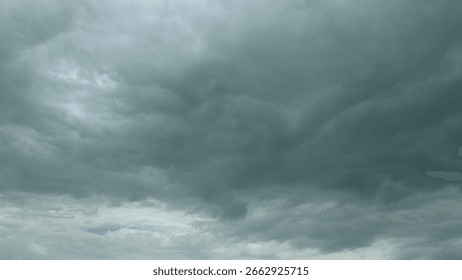 Dramatic Cloudy Sky There is a Dark Cloud Cover Overhead, creating an intense atmosphere
