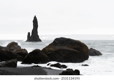 Dramatic Coastal Rocks and Waves at Black Sand Beach, Iceland - Powered by Shutterstock