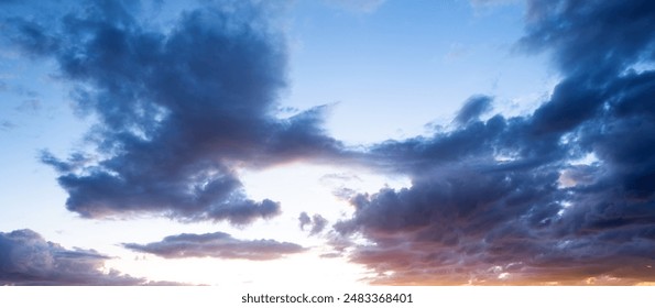 Dramatic Colorful Sunset Sky. Clouds with Sunrays. Cloudscape Sunset Background. Panorama Sky. Dramatic sky with clouds at sunset or sunrise. Sunset Sundown. Sky with colorful clouds. - Powered by Shutterstock