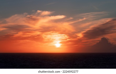 Dramatic Colorful Sunset Sky over North Atlantic Ocean. Abstract. Cloudscape Nature Background.