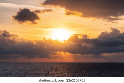 Dramatic Colorful Sunset Sky over Mediterranean Sea. Clouds with Sunrays. Cloudscape Nature Background. - Shutterstock ID 2262103755
