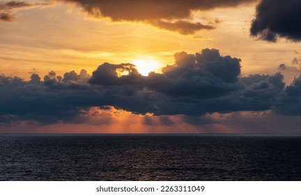 Dramatic Colorful Sunset Sky over Mediterranean Sea. Clouds with Sunrays. Cloudscape Nature Background. - Shutterstock ID 2263311049