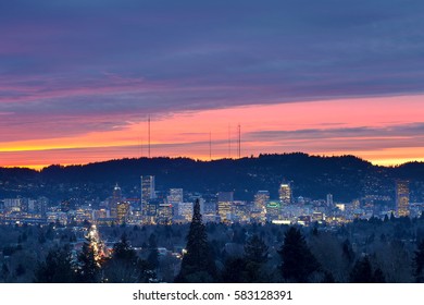 Dramatic colorful sunset sky over the city skyline of Portland Oregon