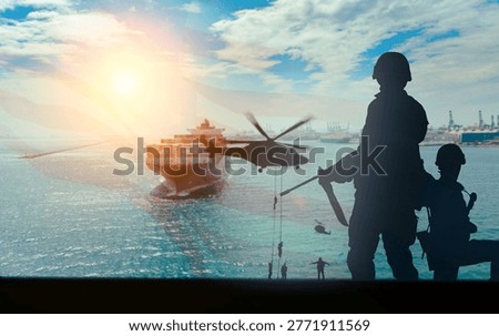 Dramatic composite image of armed military soldiers in silhouette and a helicopter with rappelling troops guarding a large cargo container ship at sea. 