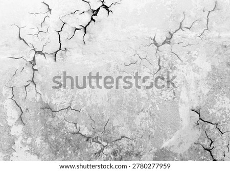 Dramatic cracked concrete wall texture background. High contrast broken cement surface with deep cracks for earthquake, damage, or aged concept.