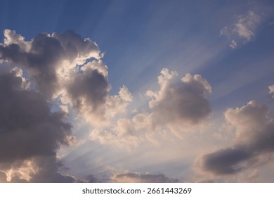 Dramatic Crepuscular Rays Breaking Through Dark Clouds