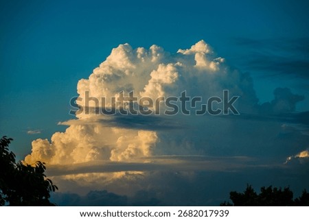 Dramatic cumulonimbus cloud at sunset