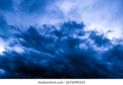 Dramatic Dark Blue Sky with Clouds