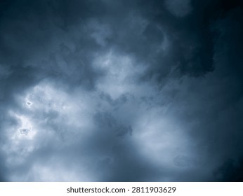 Dramatic Dark Blue Stormy Sky with Heavy Clouds Before Rain, Moody Monsoon Weather Background