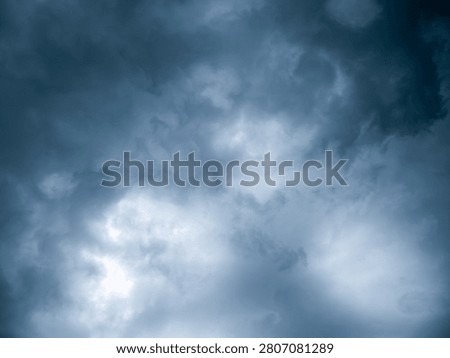Dramatic Dark Blue Stormy Sky with Heavy Clouds Before Rain, Moody Monsoon Weather Background