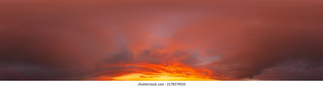 Dramatic dark burning red sunset sky panorama. Hdr seamless spherical equirectangular 360 panorama. Sky dome or zenith for 3D visualization and sky replacement for aerial drone 360 panoramas.