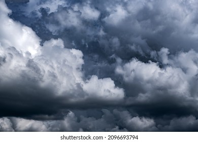 Dramatic Dark Clouds before Thunder Storm and Rain - Shutterstock ID 2096693794