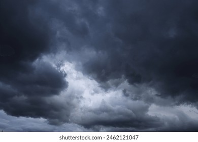 dramatic dark clouds in the sky, dark storm clouds in a dark sky before rain,beautiful landscape with cloudy sky