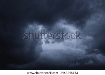 dramatic dark clouds in the sky, dark storm clouds in a dark sky before rain,beautiful landscape with cloudy sky