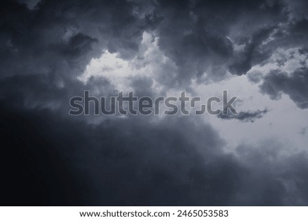 dramatic dark clouds in the sky, dark storm clouds in a dark sky before rain,beautiful landscape with cloudy sky