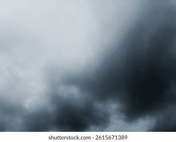 Dramatic dark cloudy sky before a storm. Moody and atmospheric image with heavy rain clouds forming in the sky, perfect for background or weather-related themes