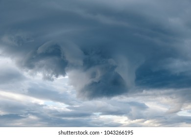 Dramatic dark cloudy sky over mountain, natural photo background