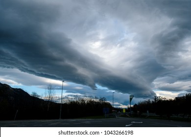 Dramatic dark cloudy sky over mountain, natural photo background