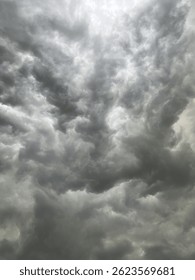 Dramatic, dark, cloudy sky overlay, sky-overlays. Dramatic sky with lighting.  Rain and Thunderstorms in dramatic sky. Bad weather with dark clouds