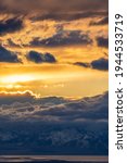 Dramatic, Dark and Cloudy Sunset Behind Stansbury Mountains across the Great Salt Lake