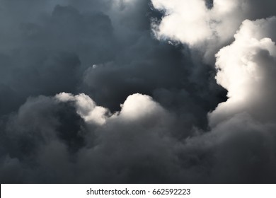 dramatic dark sky background, mystical heaven, light and shadow contrast, low saturation image 